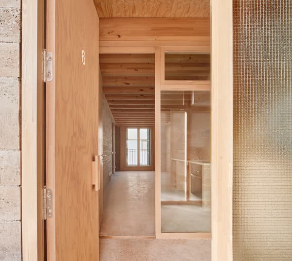 Architectural project - warm interior, natural materials, architectural detail, raw materials, wooden frame, natural light, sustainable design, green building, neutral tones, exposed beams, ceiling beams, daylight, timber ceiling, beige, brown, light wood, eco friendly, compact space, simple design, honey wood, contemporary design, Scandinavian style, minimalist style, timber walls, earthy texture, modern rustic, passive house, clean lines, cozy vibe, wood walls, open layout, inviting space, earthy tones, residential design, sleek design, functional layout, interior, glass door, nordic influence, residential, wood ceiling, corridor, hallway, smooth finish, Japandi style, wooden door, timber finish, residential hallway, home hallway, modern entry, frosted glass, hallway design, interior corridor, wood finish, clear glass, textured glass