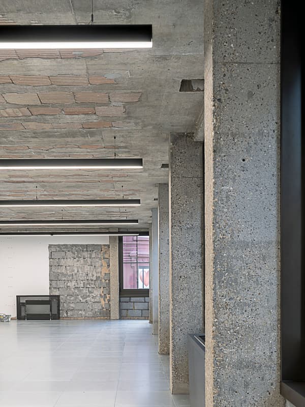 Architectural project - exposed concrete, industrial interior, raw aesthetic, industrial loft, contemporary office, modern renovation, concrete ceiling, modern loft, exposed brick, textured materials, loft conversion, polished floor, ceiling lights, brutalist design, modern space, unfinished space, concrete surface, grey tones, raw materials, industrial vibe, concrete, natural textures, neutral palette, minimalist design, adaptive reuse, industrial chic, creative space, workspace, open plan, spacious interior, grey floor, open space, structural elements, interior design, mixed materials, high ceiling, urban style, brick texture, urban vibe, urban interior
