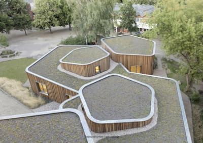 Architectural project - natural materials, wood, timber, grey, steel, metal, community space, innovative design, sustainable architecture, neutral tones, landscape architecture, brown, timber facade, eco friendly, wood exterior, natural textures, contemporary design, Scandinavian style, eco materials, modular building, eco building, green architecture, low carbon, circular design, biophilic design, wood cladding, Nordic design, modern architecture, energy efficient, earthy tones, environmental design, nature integration, passive solar, educational space, school building, public building, green roof, sedum roof, living roof, organic shapes, eco school, outdoor learning, landscape harmony, daylighting, forest integration