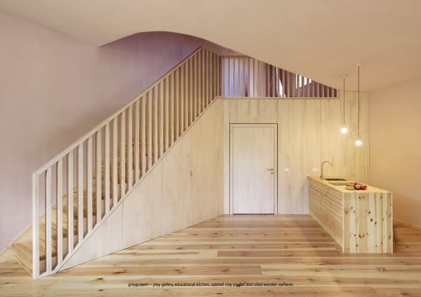 Architectural project - warm interior, intimate space, natural materials, sustainable materials, natural light, sustainable design, warm tones, eco design, neutral tones, multi-use space, light wood, natural wood, functional design, simple design, Scandinavian style, wooden floor, neutral palette, contemporary interior, relaxed atmosphere, timber walls, modern minimalism, clean lines, wood cladding, Nordic design, eco friendly home, cozy vibe, energy efficient, timber interior, open plan, inviting space, cozy corner, warm light, minimalist kitchen, bright space, compact kitchen, compact living, small kitchen, airy feel, natural interior, pale wood, pine wood, wooden staircase, wooden balustrade, educational space, learning space, group room, pendant light, biophilic elements, interior staircase, playful space, group space, educational setting, smooth surfaces, wood textures, blond wood, pastel hues, soft ambience, low energy use