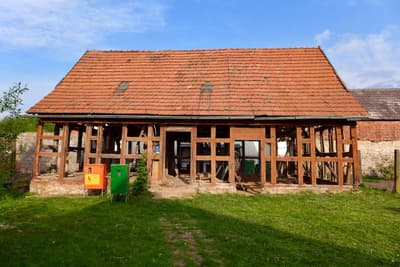 Architectural project - rural landscape, rustic, rural building, farm building, historical charm, restoration, terracotta roof, pastoral setting, historical building, renovation project, half-timbered house, natural materials, wood, timber, outdoor space, timber frame, warm tones, timber structure, exposed beams, brown, open structure, rustic vibe, vernacular architecture, weathered wood, rustic charm, countryside home, wood frame, traditional architecture, terracotta, brick, rustic facade, rural setting, greenery, traditional style, barn style, red