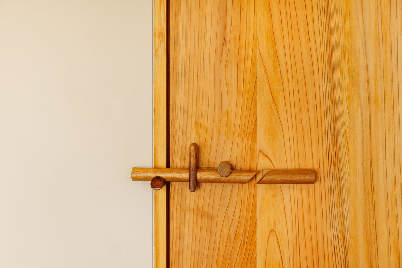 Architectural project - bespoke design, minimalist door, modern door, contemporary door, wooden handle, timber handle, minimalist handle, Japanese design, timber grain, smooth texture, sleek look, golden tones, subtle design, wooden features, calming aesthetic, warm interior, natural materials, wood elements, tranquil space, raw materials, rustic touch, sustainable design, warm tones, eco design, light wood, natural wood, simple design, honey wood, minimalist architecture, neutral palette, serene space, timber detailing, timber elements, clean lines, wood detailing, harmonious design, cozy vibe, Nordic style, inviting entrance, beige tones, warm texture, craftmanship, wood grain, Scandinavian design, understated elegance, Japanese style, timber door, wooden door