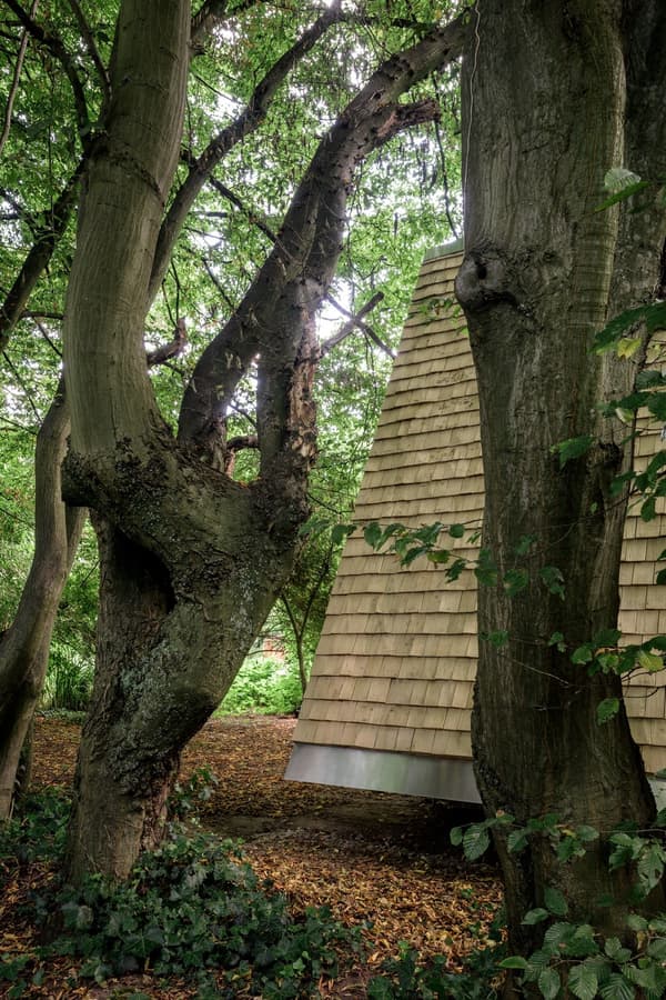 Architectural project - natural materials, eco-friendly design, wood, timber, natural tones, sustainable architecture, green, brown, natural setting, timber construction, rustic vibe, organic design, rustic charm, cozy retreat, natural landscape, biophilic design, timber cabin, rustic cabin, earthy tones, warm atmosphere, wooden shingles, treehouse, simple living, outdoor connection, wooden cabin, secluded retreat, forest hideaway, nature escape, woodland retreat, eco cabin, sustainable cabin, shingle roof, surrounded by trees, hidden cabin, woodland design, nature integration, off-grid living, woodland path, minimalist cabin, forest ambiance, shelter in nature, immersive nature, tree integration, green design, earthy palette