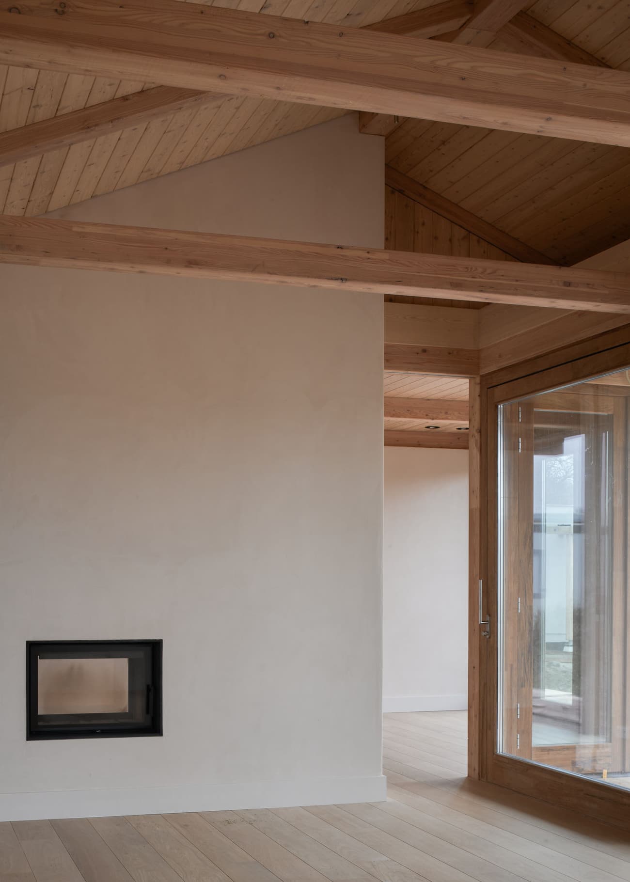 Architectural project - beige walls, loft style, wooden details, natural materials, wood, timber, raw materials, timber frame, natural light, sustainable design, glass, warm tones, eco design, neutral tones, exposed beams, daylight, wooden ceiling, beige, light wood, eco friendly, simple design, honey wood, timber beams, rustic modern, natural textures, Scandinavian style, calming space, modern rustic, biophilic design, eco home, passive house, contemporary home, clean lines, indoor outdoor, Nordic design, cozy vibe, architectural details, large window, energy efficient, plaster, airy space, timber interior, open layout, open plan, living area, inviting space, warm atmosphere, residential design, minimalist space, bright interior, family home, glass door, plaster walls, earthy textures, wood flooring, minimalistic, light wood flooring, relaxing home, wood interior
