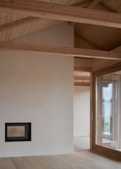 Architectural project - beige walls, loft style, wooden details, natural materials, wood, timber, raw materials, timber frame, natural light, sustainable design, glass, warm tones, eco design, neutral tones, exposed beams, daylight, wooden ceiling, beige, light wood, eco friendly, simple design, honey wood, timber beams, rustic modern, natural textures, Scandinavian style, calming space, modern rustic, biophilic design, eco home, passive house, contemporary home, clean lines, indoor outdoor, Nordic design, cozy vibe, architectural details, large window, energy efficient, plaster, airy space, timber interior, open layout, open plan, living area, inviting space, warm atmosphere, residential design, minimalist space, bright interior, family home, glass door, plaster walls, earthy textures, wood flooring, minimalistic, light wood flooring, relaxing home, wood interior