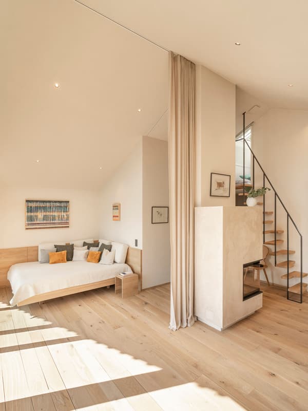 Architectural project - refined style, smart design, metal stairs, warm bedroom, floor-to-ceiling curtains, soft furnishings, modern bedroom, light wood floor, floating stairs, tranquil interior, intimate space, serene vibe, eco-friendly design, wood, timber, natural light, passive design, neutral tones, functional space, daylight, beige, light wood, Scandinavian style, timber floor, neutral palette, minimalist design, sustainable home, elegant design, white, Nordic style, energy efficient, beige tones, open layout, relaxing space, wooden flooring, bright interior, calm atmosphere, soft tones, wooden stairs, bedroom retreat, cozy bedroom, Japandi style, minimalist interior, residential interior
