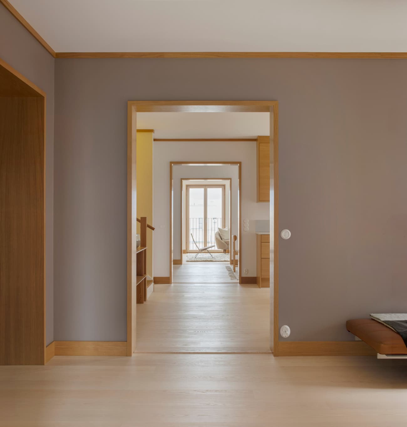 Architectural project - beige walls, cozy feel, seamless transitions, modern corridor, linear perspective, sleek interior, timber details, indoor passage, serene design, cozy interior, natural materials, tranquil space, wood, timber, neutral tones, beige, brown, light wood, Scandinavian influence, minimalist style, neutral palette, warm wood, contemporary home, clean lines, light filled, architectural simplicity, elegant design, white, open plan, minimalist decor, residential design, warm vibe, wood trim, residential space, home interior, airy atmosphere, wooden accents, smooth surfaces, minimalist hallway, interior architecture, light flooring, hallway design