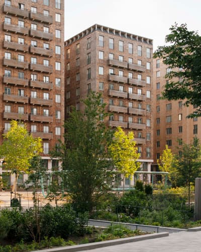 Architectural project - urban greenery, multi-story building, residential complex, vertical lines, urban residential, city oasis, natural materials, timber, city living, inviting atmosphere, passive design, sustainable design, warm tones, community space, outdoor area, urban landscape, contemporary style, green, neutral tones, urban development, neighborhood park, daylight optimization, eco friendly, green architecture, biophilic design, modern facade, timber accents, brick, brick facade, modern living, green space, urban garden, architectural rhythm, brown tones, urban retreat, urban neighborhood