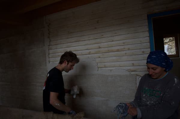 Architectural project - wood wall, casual vibe, DIY project, manual work, sustainable build, natural design, timber texture, farmhouse vibe, country style, texture wall, renovation project, rustic construction, natural materials, wood, timber, sustainable design, warm tones, grey, work in progress, construction process, construction materials, beige, casual setting, neutral colors, earth-friendly, rustic finish, plaster wall, plaster, rustic style, earthy tones, textured finish, cozy atmosphere, plaster texture, timber wall, eco renovation, home improvement, home renovation