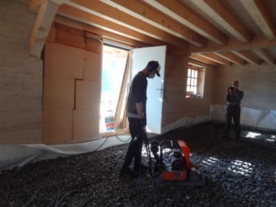 Architectural project - workshop space, window opening, earth walls, rustic structure, natural architecture, building interior, natural materials, eco-friendly design, sustainable materials, wood, timber, raw materials, natural light, passive design, warm tones, construction site, work in progress, exposed beams, daylight, construction equipment, beige, brown, light wood, minimalist construction, timber beams, building process, sustainable building, eco construction, structural beams, rammed earth, eco build, energy efficient, foundation, earthy vibe, rustic style, earthy tones, textured walls, gravel, architectural process, renovation, wood door, remodel