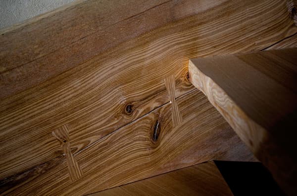 Architectural project - raw elegance, wood joints, rustic interior, timber texture, interior detail, heritage style, earthy design, rustic staircase, natural materials, architectural detail, wood, timber, organic texture, warm tones, beige, brown, timber detail, light wood, natural wood, rustic charm, natural finish, warm wood, rustic finish, wood texture, earthy tones, traditional craftsmanship, artisanal design, natural ambiance, craftsmanship, cozy home, wooden staircase, timber steps