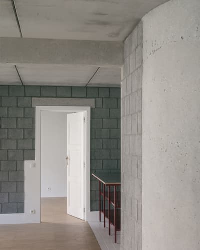 Architectural project - exposed concrete, urban feel, unfinished look, modern renovation, open doorway, transitional space, industrial, white door, concrete interior, cement block wall, gray wall, modular block, interior threshold, minimal vibe, concrete aesthetic, brutalist design, structural simplicity, clean transition, architectural concept, unique wall texture, light ambiance, cement, raw, minimalist, architectural detail, grey tones, raw materials, grey, neutral tones, functional space, concrete, geometric pattern, modern aesthetic, industrial style, minimalist design, contemporary home, clean lines, white, textured wall, open plan, residential space, neutral, modern interior