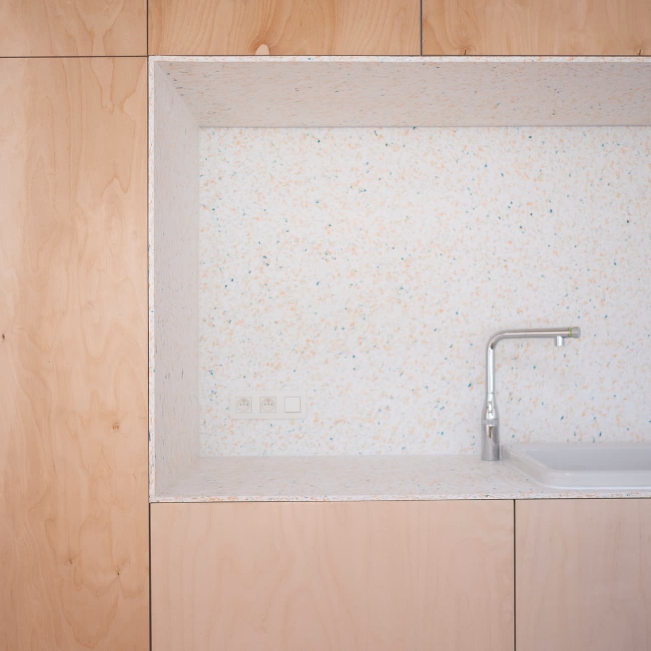 Architectural project - contemporary kitchen, neutral kitchen, Japandi influence, apartment kitchen, inviting, integrated sink, built-in sink, chrome, kitchen nook, urban kitchen, pastel tones, wood, timber, metal, natural light, sustainable design, daylight, beige, light wood, natural wood, functional design, eco friendly, compact space, simple design, Scandinavian style, calming space, cozy space, clean lines, white, Nordic design, home kitchen, warm vibe, minimalist kitchen, modern kitchen, wood cabinetry, timber cabinetry, bright space, soft tones, small kitchen, sleek faucet, practical layout