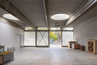 Architectural project - grid windows, passive lighting, light grey, workshop, modern industrial, loft style, concrete ceiling, skylights, renovation potential, glass blocks, rustic industrial, raw space, warehouse, circular skylight, unfinished space, storage area, grey interior, utility room, large space, minimal design, wood, steel, natural light, sustainable design, recycled materials, glass, contemporary style, grey, neutral tones, exposed beams, functional space, daylight, industrial vibe, construction materials, building site, concrete, simple design, adaptable space, structural beams, durable materials, natural ventilation, light filled, open plan, eco friendly space, concrete floor, industrial space, versatile space, high ceiling, urban style