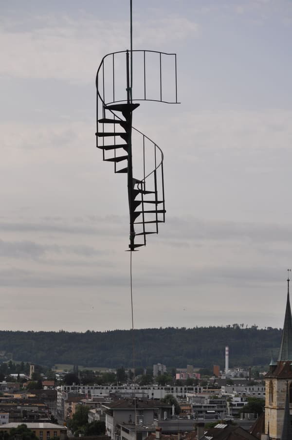 Architectural project - sky, metalwork, structural art, exterior architecture, city skyline, minimal vibe, floating stairs, elevated design, architectural detail, urban setting, industrial design, steel, metal, cityscape, contemporary architecture, urban landscape, grey, outdoor installation, industrial vibe, outdoor, minimal structure, open framework, geometric design, modern aesthetics, urban, structural element, panoramic view, open air, outdoor design, modernist style, aerial view, architectural feature, urban view, metal staircase