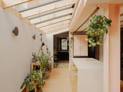 Architectural project - green accents, modern renovation, indoor garden, plant shelf, sleek surfaces, modern corridor, bright hallway, modular furniture, polished finish, wall sconces, hanging plants, cozy interior, pastel tones, natural light, warm tones, eco design, exposed beams, daylight, beige, light wood, simple design, wood beams, timber beams, architectural lighting, minimalist style, neutral palette, relaxed atmosphere, Scandinavian vibe, eco-friendly materials, light tones, biophilic design, sustainable home, contemporary home, inviting home, Nordic style, airy space, casual living, open layout, open plan, minimalist decor, greenery, home office, welcoming space, clean design, skylight, indoor outdoor flow