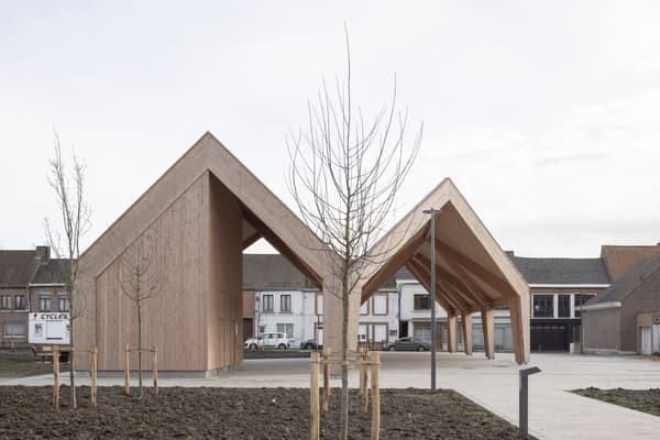 Architectural project - airy structure, angular roof, slanted roof, open span, urban integration, timber pavilion, seamless blend, wooden planks, natural materials, architectural design, urban area, warm tones, community space, outdoor area, contemporary style, sustainable architecture, functional space, light wood, open design, eco friendly, modern design, timber construction, honey wood, Scandinavian style, neutral palette, minimalist design, public space, gathering area, modern pavilion, wood structure, exposed wood, minimal aesthetic, Nordic style, inviting space, pitched roof, natural texture, open pavilion, landscape design, outdoor shelter, wooden facade, simple lines, clean design, light beige