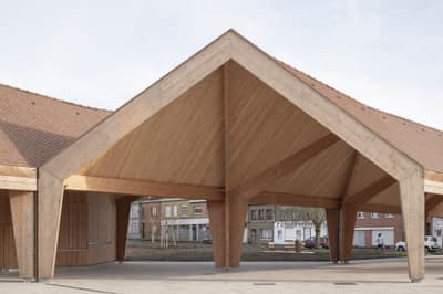 Architectural project - public venue, gathering place, community gathering, urban pavilion, architectural landmark, civic architecture, public pavilion, eco pavilion, natural materials, timber, timber frame, natural light, warm tones, contemporary architecture, timber structure, daylight, beige, brown, roof design, natural wood, modern design, wood beams, rustic modern, wooden pavilion, public space, community center, social hub, outdoor venue, urban design, sustainable structure, geometric design, warm wood, exposed wood, clean lines, timber cladding, inviting space, triangular roof, pavilion design, wooden facade, exterior space, architectural feature
