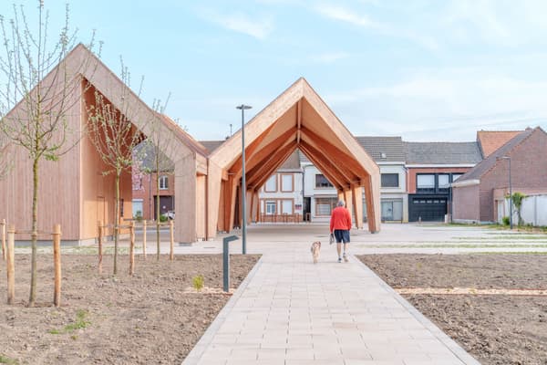 Architectural project - pedestrian walkway, landscaping, inviting design, light gray, outdoor path, walkway, neutral color palette, architectural design, wood, timber, wooden frame, passive design, community space, contemporary architecture, timber structure, urban development, beige, light wood, natural wood, open design, daylight optimization, rural architecture, rustic vibe, leisure space, eco-friendly construction, minimalist architecture, social space, community hub, public space, gathering area, sustainable structure, open-air venue, modern pavilion, timber panels, open pavilion, gabled roof, simple lines