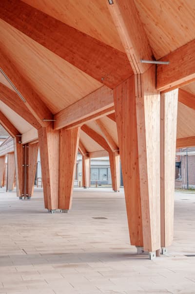 Architectural project - expansive space, structural elegance, civic architecture, natural materials, wood, timber, raw materials, passive design, warm tones, eco design, exposed structure, community space, timber structure, exposed beams, industrial vibe, open area, gathering space, structural design, light wood, natural wood, low carbon design, functional design, wooden beams, timber construction, honey wood, timber beams, minimalist architecture, contemporary design, industrial touch, outdoor pavilion, public space, wood construction, urban design, timber detailing, modern pavilion, light tones, sustainable building, circular construction, durable materials, timber architecture, green architecture, wood detailing, modern architecture, open pavilion, wooden structure, architectural rhythm, wooden columns