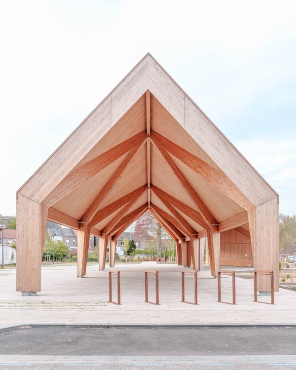 Architectural project - minimal architecture, airy structure, angular roof, ecological architecture, timber pavilion, wood columns, structural clarity, natural materials, wood, timber, outdoor space, natural light, sustainable design, warm tones, community space, contemporary style, structural timber, exposed beams, public installation, daylight, gathering space, beige, exterior design, visual rhythm, light wood, eco friendly, wooden beams, outdoor structure, timber construction, honey wood, minimalist design, public space, pavilion, urban design, landscape integration, modern architecture, Nordic style, sloped roof, open pavilion, wooden elements, Scandinavian design, bright space, architectural geometry, architectural form