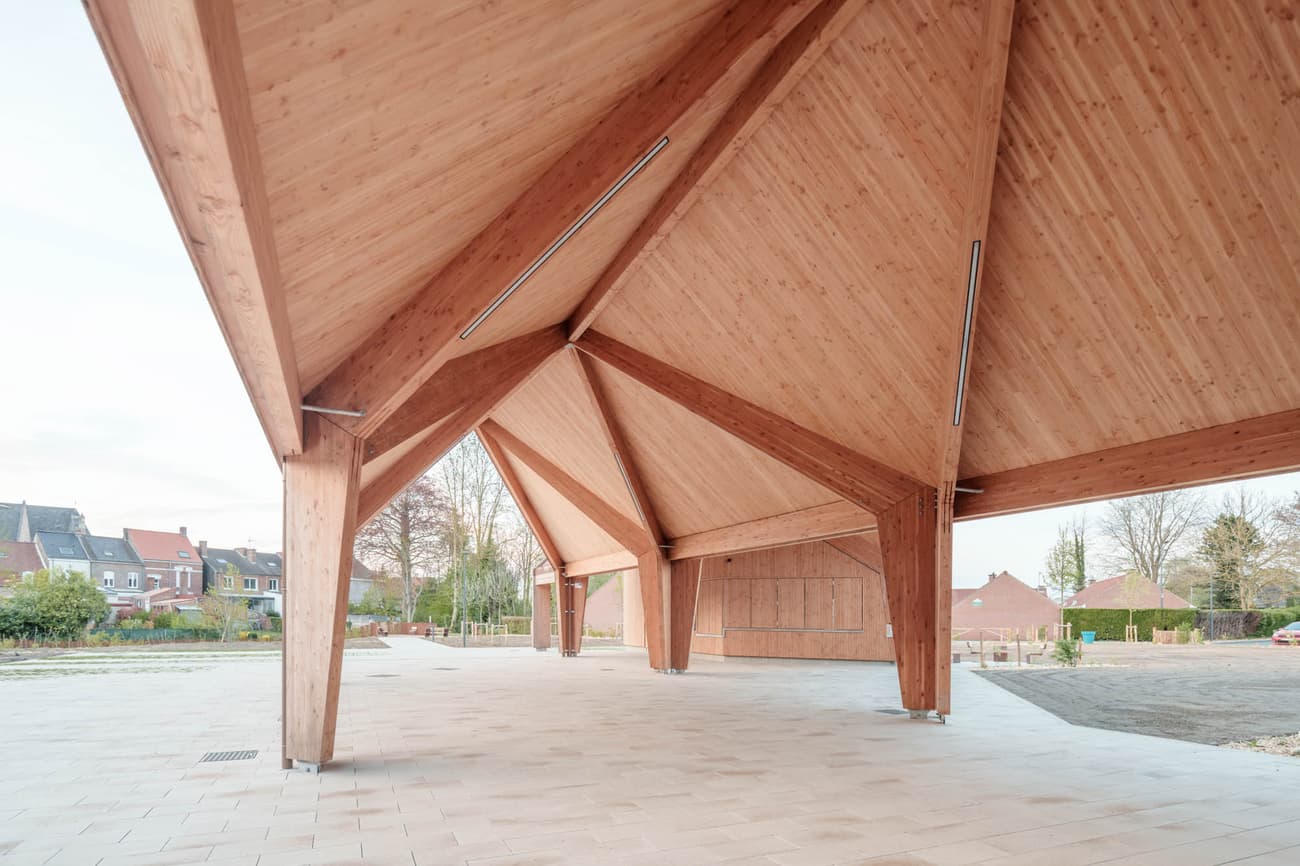 Architectural project - timber pavilion, community area, ceiling structure, natural materials, sustainable materials, wood, timber, outdoor space, natural light, passive design, warm tones, modular design, eco design, green building, sustainable architecture, neutral tones, timber structure, exposed beams, daylight, beige, brown, light wood, engineered wood, eco friendly, wooden beams, timber construction, honey wood, timber beams, contemporary design, minimalist design, outdoor pavilion, public space, gathering area, event space, lightweight structure, geometric design, modern pavilion, wood structure, warm ambiance, inviting space, open pavilion, architectural lines