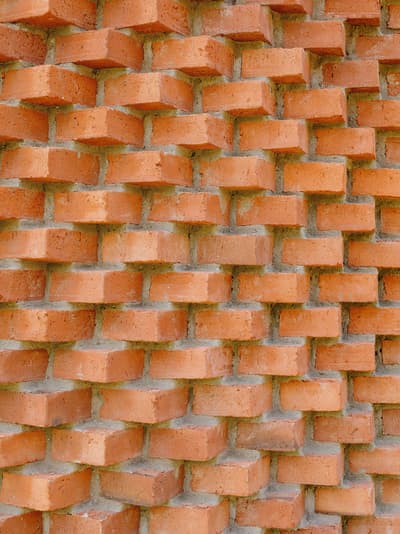 Architectural project - brick wall, outdoor wall, brickwork, brick material, masonry, brick detail, decorative wall, orange brick, raw materials, warm tones, industrial vibe, structural design, exterior design, building facade, visual rhythm, exterior wall, architectural texture, orange, construction detail, natural material, rustic texture, textured wall, earthy tones, rustic design, textured finish, terracotta, rustic wall, brick facade, red brick, sustainable material, design detail, facade design, brick texture, architectural element, red
