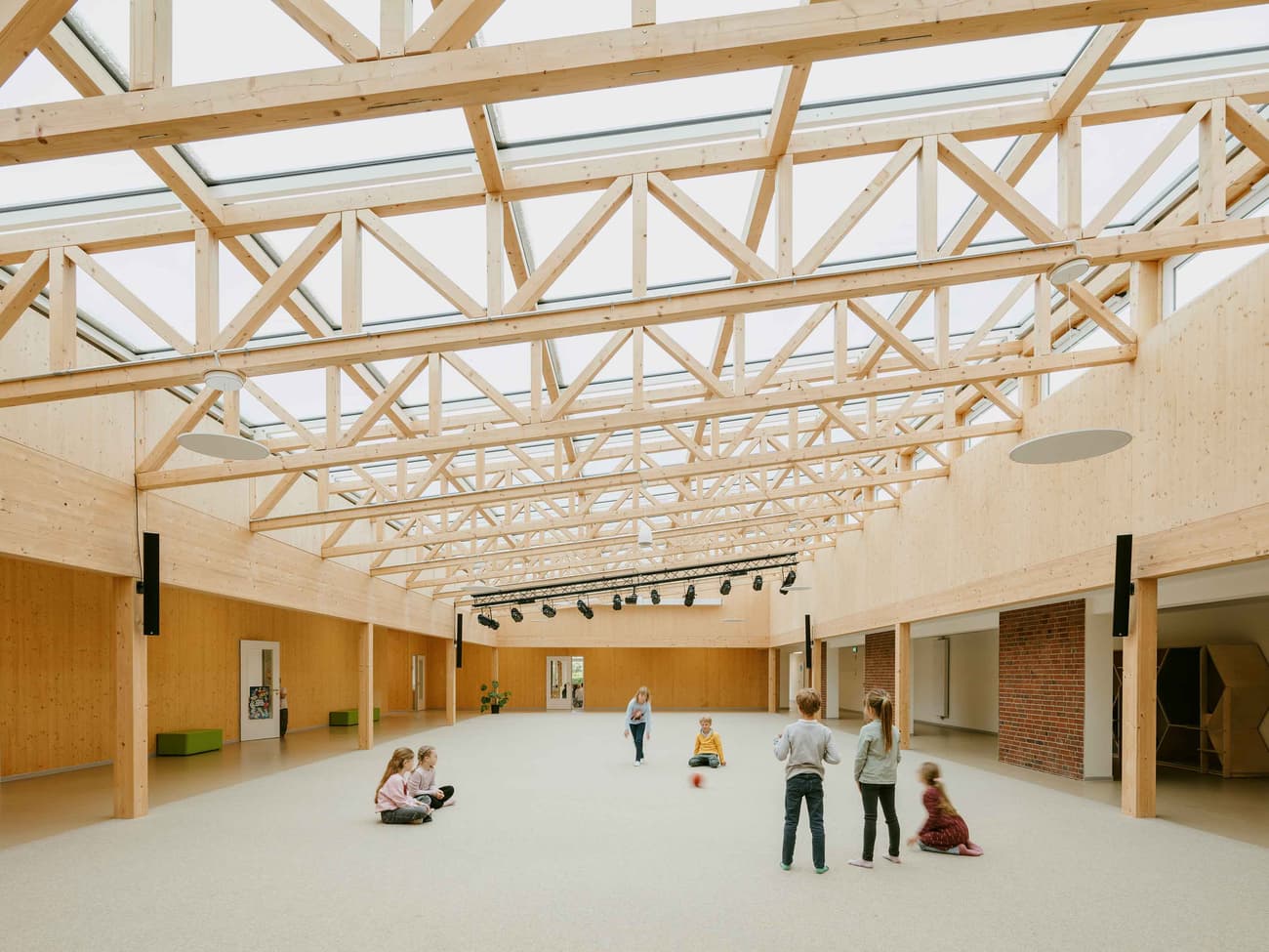 Architectural project - eco-friendly design, wood, timber, natural light, eco-conscious, glass, warm tones, green building, contemporary architecture, neutral tones, timber structure, daylight, beige, light wood, modern aesthetic, functional design, recreational space, wood beams, Scandinavian style, gathering area, community center, sustainable building, light filled, timber cladding, Nordic design, landscape view, inviting space, spacious interior, airy atmosphere, educational space, skylight, minimalist interior, play area, family-friendly, wooden walls