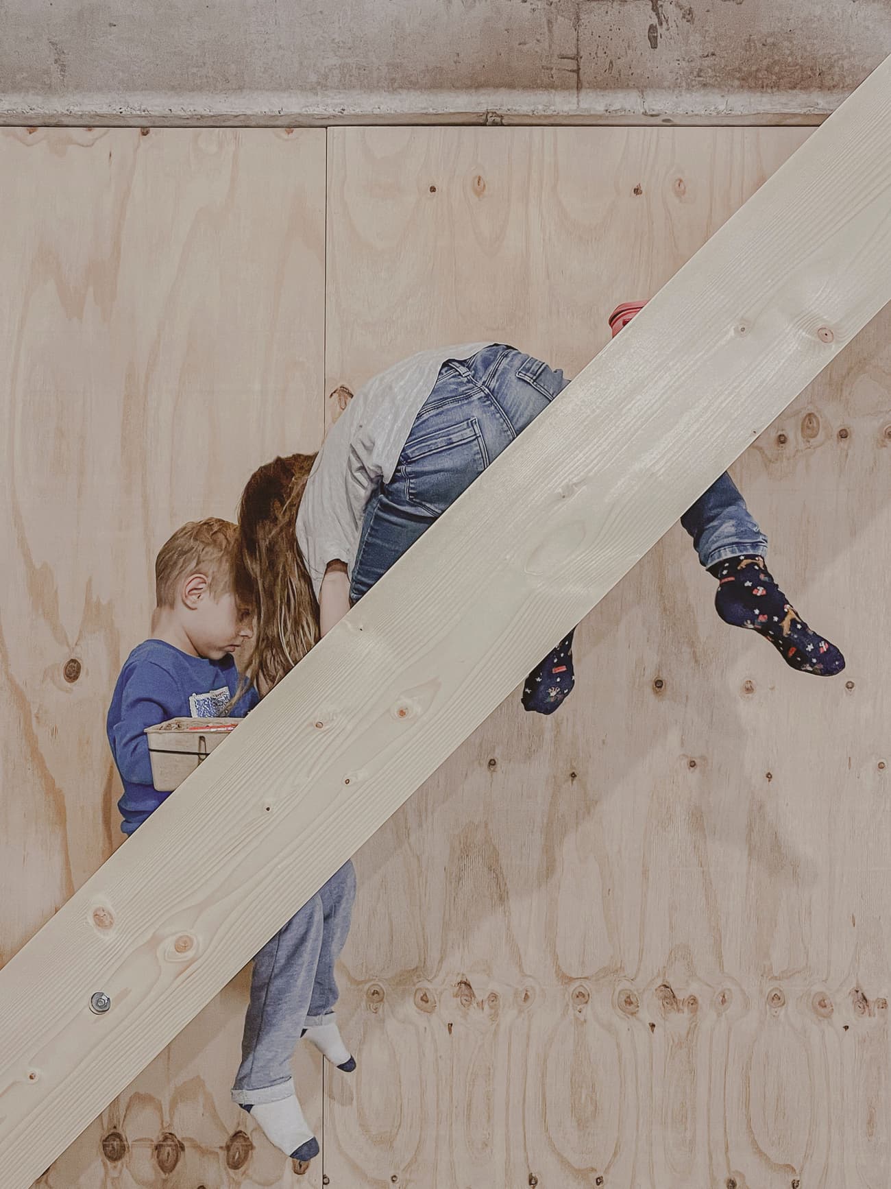Architectural project - DIY project, indoor play, natural materials, sustainable materials, warm tones, beige, light wood, eco friendly, Scandinavian style, neutral palette, minimalist design, relaxed atmosphere, natural finish, creative space, wood structure, plywood wall, minimal aesthetic, Nordic style, family space, wood texture, child friendly, playful vibe, cozy corner, residential space, home interior, simple lines, timber wall, clean design, home renovation, play area, urban living