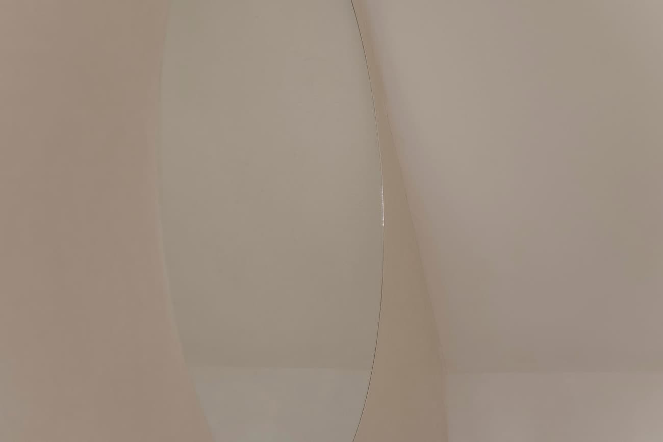 Architectural project - peaceful environment, cozy ambiance, interior detail, smooth surface, refined design, architectural detail, soft lighting, tranquil space, contemporary style, modern aesthetic, minimalist design, neutral colors, soft textures, light tones, clean lines, simple elegance, warm atmosphere, beige wall, modern style, minimal decor, curved wall, understated elegance, calming vibe, seamless design, architectural element