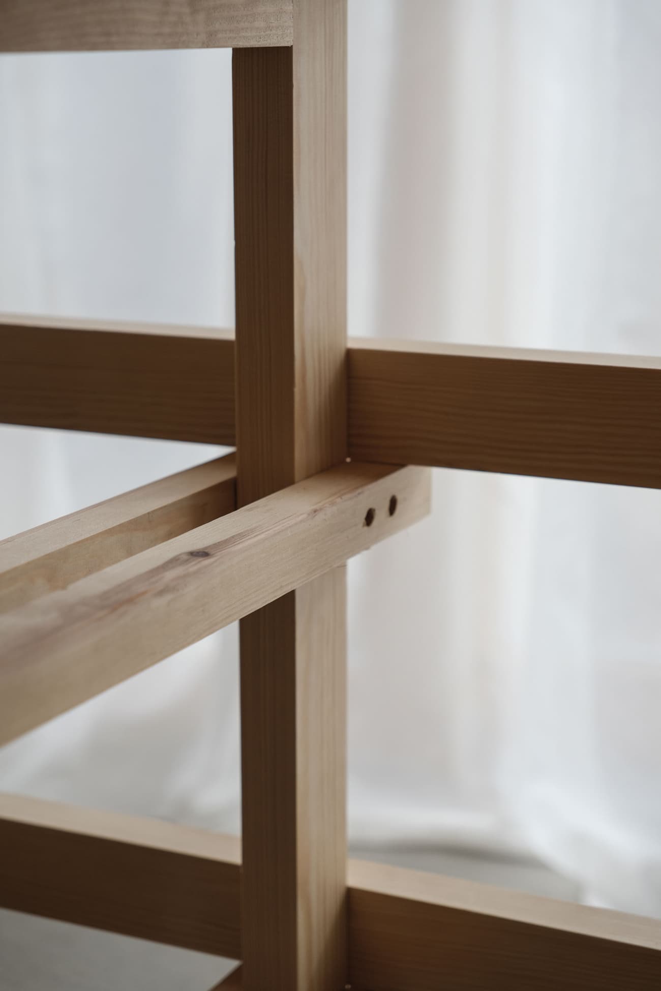 Architectural project - raw aesthetic, architectural clarity, timber framework, warm interior, natural materials, architectural detail, timber, passive design, sustainable design, warm tones, light wood, natural wood, minimalist construction, daylight optimization, eco friendly, wooden beams, honey wood, contemporary design, Scandinavian style, neutral palette, minimalist design, open framework, natural finish, wood structure, structural detail, construction detail, raw texture, modern rustic, clean lines, Nordic design, cozy vibe, wood texture, simple construction, architectural rhythm