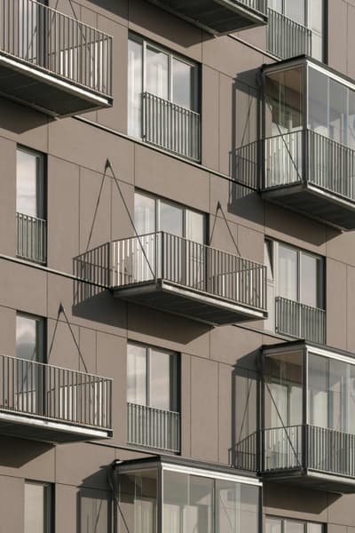 Architectural project - vertical rhythm, contemporary exterior, rhythmic pattern, residential complex, geometric lines, urban residential, grey facade, urban aesthetic, streamlined design, functional aesthetic, structured facade, architectural detail, city living, metal, cityscape, sustainable design, glass, modular design, grey, urban development, industrial vibe, concrete, contemporary design, industrial touch, minimalist design, modern facade, clean lines, residential building, balcony design, urban architecture, sleek exterior, energy efficiency, apartment building, modern urban, exterior cladding, eco facade, urban living, modern materials