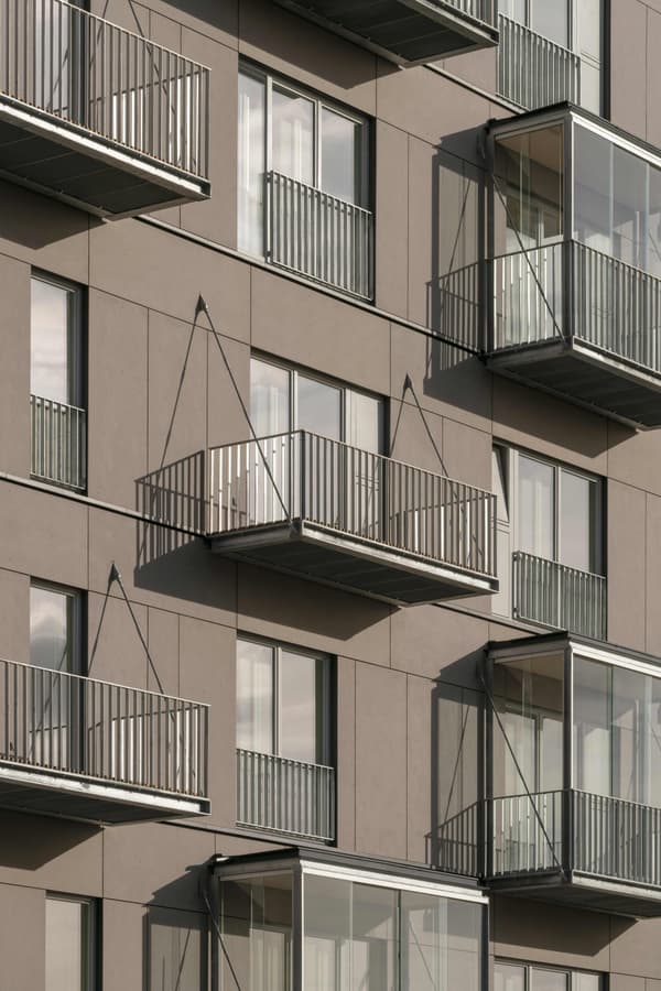 Architectural project - vertical rhythm, contemporary exterior, rhythmic pattern, residential complex, geometric lines, urban residential, grey facade, urban aesthetic, streamlined design, functional aesthetic, structured facade, architectural detail, city living, metal, cityscape, sustainable design, glass, modular design, grey, urban development, industrial vibe, concrete, contemporary design, industrial touch, minimalist design, modern facade, clean lines, residential building, balcony design, urban architecture, sleek exterior, energy efficiency, apartment building, modern urban, exterior cladding, eco facade, urban living, modern materials