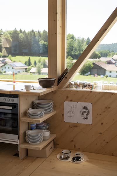Architectural project - natural materials, wood, timber, natural light, inviting atmosphere, sustainable design, warm tones, eco design, exposed structure, neutral tones, daylight, beige, light wood, natural wood, eco friendly, wooden beams, simple design, honey wood, timber beams, rustic modern, Scandinavian style, minimalist design, modern rustic, eco home, sustainable home, Nordic style, large window, wood kitchen, timber kitchen, cozy kitchen, countryside kitchen, wood shelves, timber shelves, open shelves, countryside view, rural view, kitchen storage, open storage, family kitchen, home kitchen, airy space, bright kitchen, rustic style, comfortable home, rural living, relaxed living, casual living, informal dining, handcrafted touch, artisanal feel