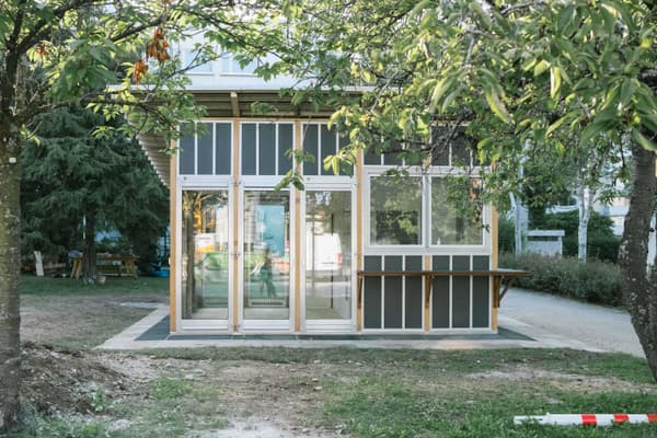 Architectural project - small house, prefab structure, garden house, green spaces, garden setting, minimal design, natural materials, wood, timber, timber frame, natural light, outdoor living, glass, natural tones, eco design, green building, simple structure, grey, green, neutral tones, daylight, beige, eco friendly, natural setting, retreat space, minimalist design, low carbon, sustainable home, large windows, indoor outdoor, timber cladding, wood cladding, white, modular home, wood frame, compact design, small structure, nature integration, cottage style, glass facade, modern cabin, small footprint, tiny home