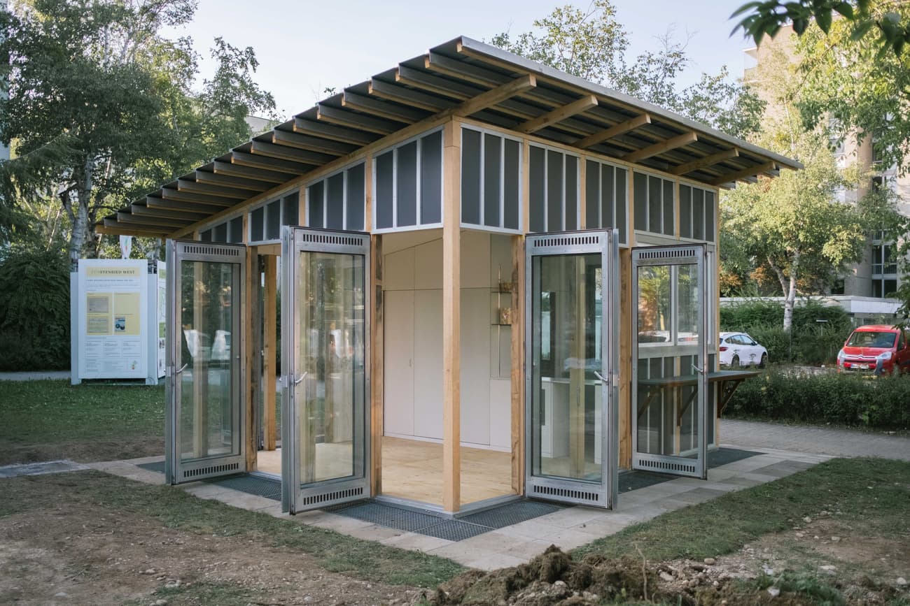 Architectural project - flexible space, compact structure, garden pavilion, sustainable space, Scandinavian touch, garden setting, contemporary look, eco-friendly design, wood, timber, steel, timber frame, passive design, glass, warm tones, natural tones, modular design, urban park, daylight, multi-use space, light wood, open structure, honey wood, modern simplicity, minimalist style, exterior, adaptable structure, small building, modular pavilion, green architecture, natural ventilation, clean lines, light filled, wood frame, glass walls, inviting space, nature-inspired, outdoor connection, garden view, small pavilion, bright space, urban architecture, practical design