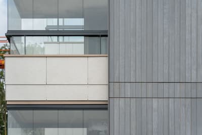 Architectural project - terrace, urban residential, floor to ceiling windows, metal cladding, light grey, ventilated facade, eco-friendly design, sustainable materials, city living, metal, cityscape, natural light, passive design, glass, neutral tones, concrete, minimalist facade, low carbon design, daylight optimization, glass panels, contemporary design, modern aesthetics, sustainable building, modern facade, clean lines, large windows, modern architecture, urban architecture, vertical cladding, facade rhythm, sleek exterior, glass facade, building envelope, architectural contrast, reflective glass, residential facade, eco facade, urban vibe