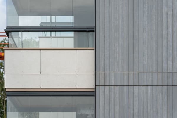 Architectural project - terrace, urban residential, floor to ceiling windows, metal cladding, light grey, ventilated facade, eco-friendly design, sustainable materials, city living, metal, cityscape, natural light, passive design, glass, neutral tones, concrete, minimalist facade, low carbon design, daylight optimization, glass panels, contemporary design, modern aesthetics, sustainable building, modern facade, clean lines, large windows, modern architecture, urban architecture, vertical cladding, facade rhythm, sleek exterior, glass facade, building envelope, architectural contrast, reflective glass, residential facade, eco facade, urban vibe
