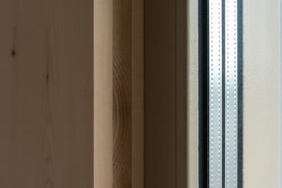 Architectural project - metal texture, timber grain, minimalist detail, interior detail, refined design, natural materials, architectural detail, eco-friendly design, wood, timber, metal frame, metal, timber frame, warm tones, contemporary style, neutral tones, beige, light wood, modern design, industrial touch, simple elegance, Nordic style, wood frame, structural element, wood grain, subtle texture, Scandinavian design, timber panel, craftsmanship, smooth finish, wood panel, texture contrast