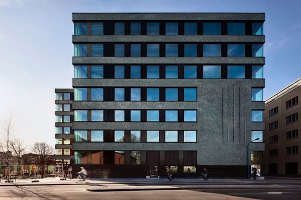 Architectural project - geometric lines, facade articulation, silver, urban office, modern workspace, angular design, contrasting materials, functional architecture, commercial building, city vibes, city view, modern office, office building, structured facade, work environment, new build, urban setting, city living, urban lifestyle, cityscape, eco design, urban landscape, sustainable architecture, grey, neutral tones, urban development, minimalist facade, daylight optimization, blue, modern design, minimalist aesthetics, black, clean lines, sleek design, contemporary facade, urban architecture, facade design, glass facade, energy efficiency, reflective glass