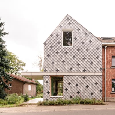 Architectural project - harmonious blend, landscaping, design contrast, inviting entry, classic design, masonry, curb appeal, brick cladding, eco exterior, architectural detail, outdoor space, natural light, passive design, sustainable design, warm tones, neutral tones, daylight, beige, exterior design, modern facade, clean lines, large window, energy efficient, pitched roof, terracotta, red brick, greenery, garden view, shingle cladding, gabled roof, residential house, family home, textured facade, contemporary facade, suburban home, window frame, mixed materials, brick building, street view, urban housing