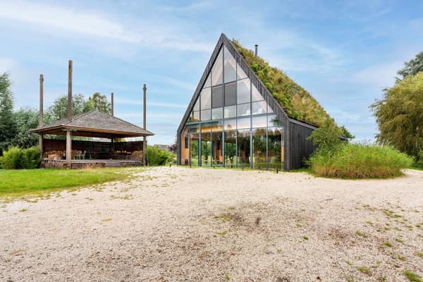 Architectural project - glazed facade, countryside escape, ambient light, modern landscape, modern barn, barn conversion, eco barn, full-height glass, rural getaway, nature blending, natural materials, eco-friendly design, wood, timber, metal, passive design, glass, natural tones, green building, sustainable architecture, green, landscape architecture, beige, brown, natural setting, rural architecture, contemporary touch, rustic modern, rustic charm, modern rustic, biophilic design, open landscape, scenic view, landscape integration, large windows, timber cladding, wood cladding, countryside home, energy efficient, pitched roof, nature-inspired, triangular roof, countryside living, eco retreat, passive solar, seamless indoor outdoor, glass facade, green roof, rural retreat