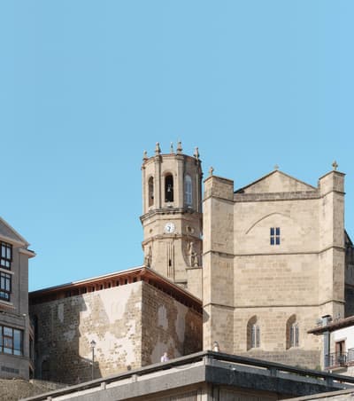 Architectural project - stone facade, light stone, stone masonry, masonry work, historic building, cultural heritage, historic preservation, arched windows, city view, architectural heritage, classic design, masonry, heritage site, cultural landmark, medieval style, historic charm, skyline view, picturesque view, vintage architecture, historic skyline, architectural detail, urban landscape, grey, neutral tones, beige, rustic charm, blue sky, stone, traditional architecture, exterior view, sky view, stone texture