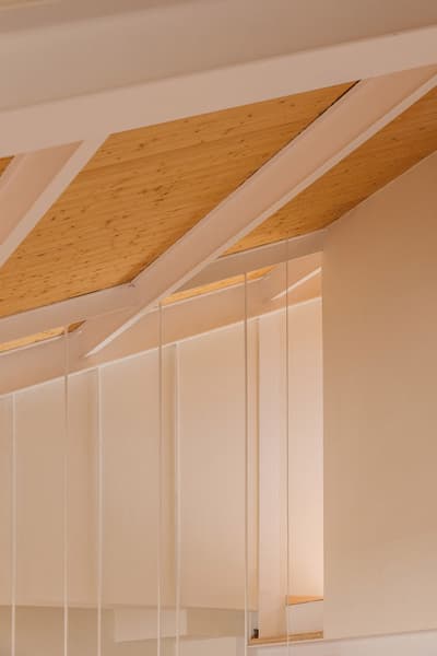 Architectural project - beige walls, refined style, architectural clarity, white beams, spacious design, elegant finish, cozy interior, serene vibe, natural materials, architectural detail, wood, timber, natural light, sustainable design, warm tones, neutral tones, exposed beams, daylight, beige, light wood, modern aesthetic, modern design, honey wood, minimalist architecture, Scandinavian style, neutral palette, eco-friendly materials, contemporary home, clean lines, white, Nordic design, wooden interior, timber ceiling, airy space, timber interior, open layout, open plan, warm atmosphere, residential design, bright interior, sleek design, wood ceiling, architectural elegance, timber paneling, high ceiling, double height, vaulted ceiling