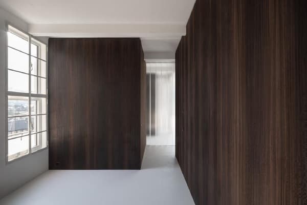 Architectural project - refined style, subtle elegance, city view, smooth surface, tranquil interior, dark timber, sleek wall, apartment interior, moody atmosphere, sophisticated interior, intimate space, architectural detail, timber, natural light, warm tones, grey, neutral tones, brown, compact space, sunlight, neutral palette, contemporary interior, minimalist design, serene space, warm wood, clean lines, timber cladding, wood cladding, elegant design, white, modern architecture, large window, cozy nook, timber interior, minimalist space, bright interior, sleek design, residential, home interior, open window, timber wall, modern minimalist, wood panel, dark tones, geometric form, dark wood, urban apartment
