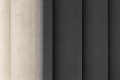 Architectural project - linear design, exposed concrete, raw concrete, vertical lines, striking design, concrete texture, materiality, texture, modernist design, brutalist architecture, pillar, concrete column, architectural column, monolithic structure, rhythm, symmetry, facade element, bold structure, strong presence, grey tones, industrial design, shadow play, contemporary architecture, grey, industrial vibe, light and shadow, modern design, minimalist style, neutral palette, urban design, structural element, robust design, sleek design, timeless design, urban architecture, texture contrast, architectural feature, architectural form