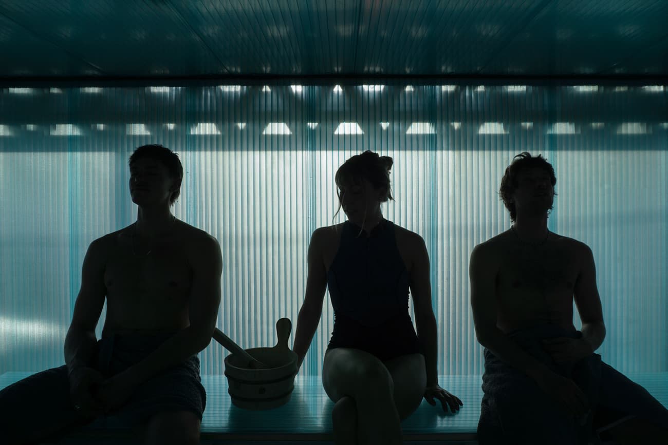 Architectural project - sauna, relaxation space, relaxation zone, contemporary spa, soft lighting, shadow play, translucent panels, polycarbonate, modern design, wellness center, silhouetted figures, spa environment, minimalist vibe, soothing atmosphere, calm ambiance, architectural lighting, silhouette design, private retreat, modern wellness, well-being, leisure space, water therapy, healing environment, retreat space, calming interior, serene atmosphere, peaceful setting, meditative space, low-light ambiance, minimalist aesthetics, sanctuary, personal retreat, therapeutic design, intimate setting, hydrotherapy, rejuvenation zone, atmospheric lighting, private spa, silence space, polycarbonate panels, minimalist retreat