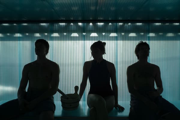 Architectural project - sauna, relaxation space, relaxation zone, contemporary spa, soft lighting, shadow play, translucent panels, polycarbonate, modern design, wellness center, silhouetted figures, spa environment, minimalist vibe, soothing atmosphere, calm ambiance, architectural lighting, silhouette design, private retreat, modern wellness, well-being, leisure space, water therapy, healing environment, retreat space, calming interior, serene atmosphere, peaceful setting, meditative space, low-light ambiance, minimalist aesthetics, sanctuary, personal retreat, therapeutic design, intimate setting, hydrotherapy, rejuvenation zone, atmospheric lighting, private spa, silence space, polycarbonate panels, minimalist retreat