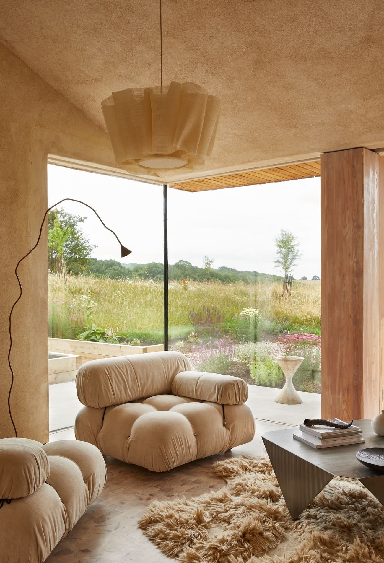 Architectural project - architectural design, timber, fabric, relaxed vibe, natural light, glass, warm tones, eco design, daylight, beige, brown, light wood, rustic modern, Scandinavian style, neutral palette, calming space, soft textures, modern rustic, biophilic design, contemporary home, nature view, large windows, indoor outdoor, Nordic style, landscape view, textured wall, open plan, inviting space, earthy tones, cozy corner, tranquil atmosphere, seating area, comfortable seating, floor to ceiling glass, lounge area, pendant light, sustainable interior, cozy living room, natural living room, beige living room, plush armchair, fluffy rug, wood panel, wooden accent, minimalism, Japandi, serene home, lounge furniture, casual elegance