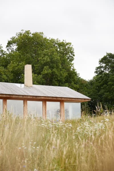 Architectural project - sustainable materials, timber, outdoor space, passive design, sustainable design, glass, warm tones, neutral tones, beige, timber facade, eco friendly, rural architecture, organic design, serene atmosphere, minimalist architecture, contemporary design, calming space, pavilion, tranquil setting, light tones, eco construction, natural landscape, green architecture, biophilic design, timber roof, large windows, wood cladding, timber house, countryside home, rural living, nature-inspired, outdoor connection, peaceful vibe, greenery, eco architecture, eco house, wooden house, bright interior, open view, glass facade, natural surroundings, understated elegance, rural retreat, modern retreat, nature setting, nature harmony, integrated landscape